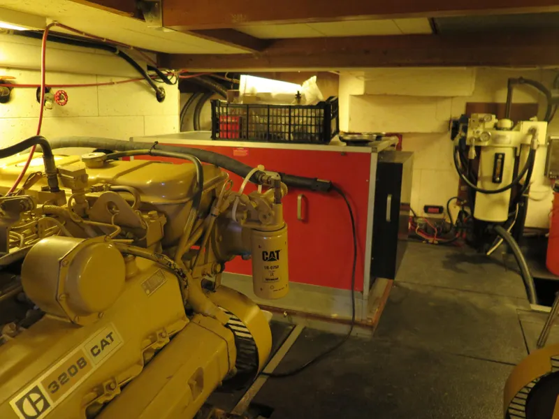 Slide: The Image of Engine room of 1985 CHB Flush Deck Aftcabin with CAT 3208 engine. - 34