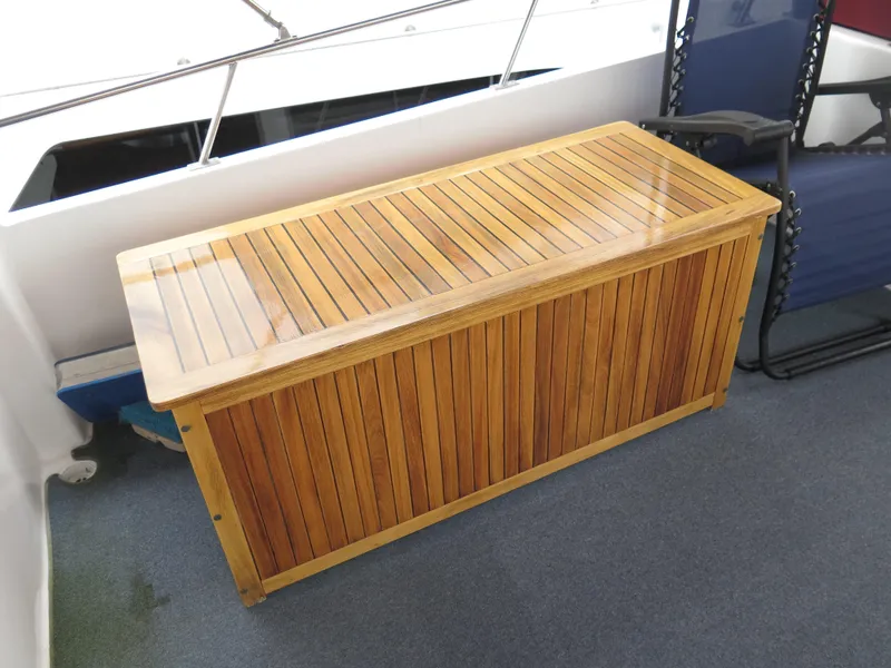Slide: The Image of Wooden storage bench on 1985 CHB Flush Deck Aftcabin boat deck. - 7