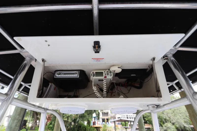 Slide: The Image of 2001 Fountain 25CC boat console with radio and communication equipment. - 14