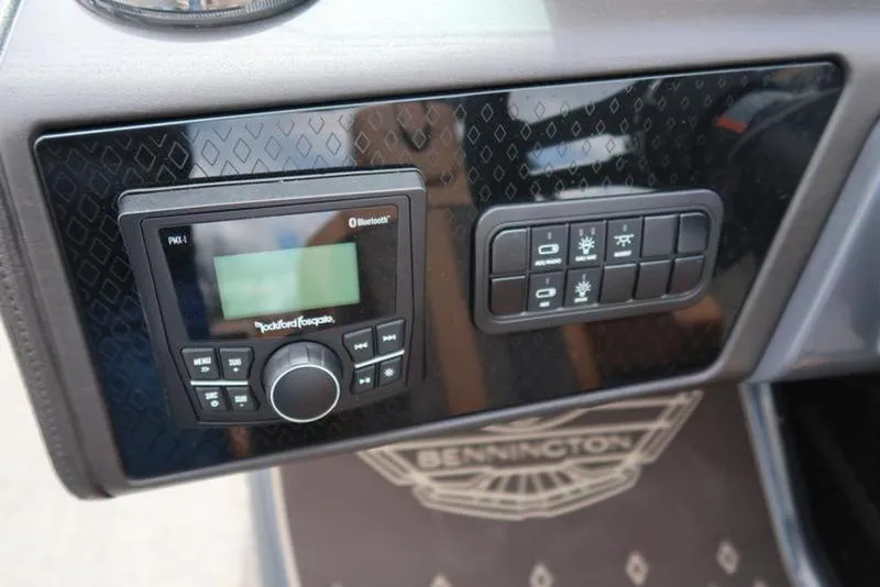 Slide: The Image of Control panel of 2025 Bennington M Quad Bench 24 MFB with Bluetooth and lighting controls. - 20