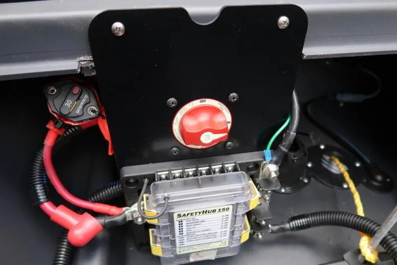 Slide: The Image of Electrical panel of 2025 Bennington M Quad Bench 24 MFB with SafetyHub 150. - 9