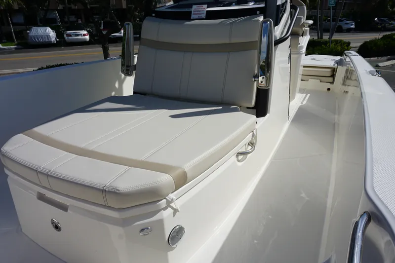 Slide: The Image of 2026 Boston Whaler 250 Dauntless boat interior with cushioned seating. - 20