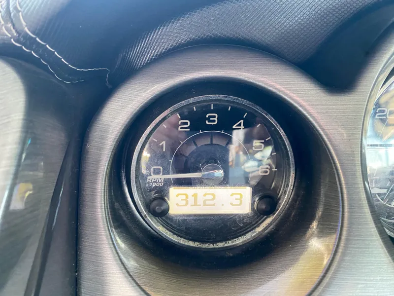 Slide: The Image of Close-up of 2012 Monterey 328SS tachometer displaying 312.3 RPM. - 9