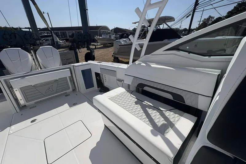 Slide: The Image of 2026 Blackfin 272 DC boat interior with sleek seating and modern design. - 17