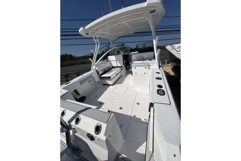 Slide: The Image of 2026 Blackfin 272 DC boat interior with seating and storage compartments. - 20