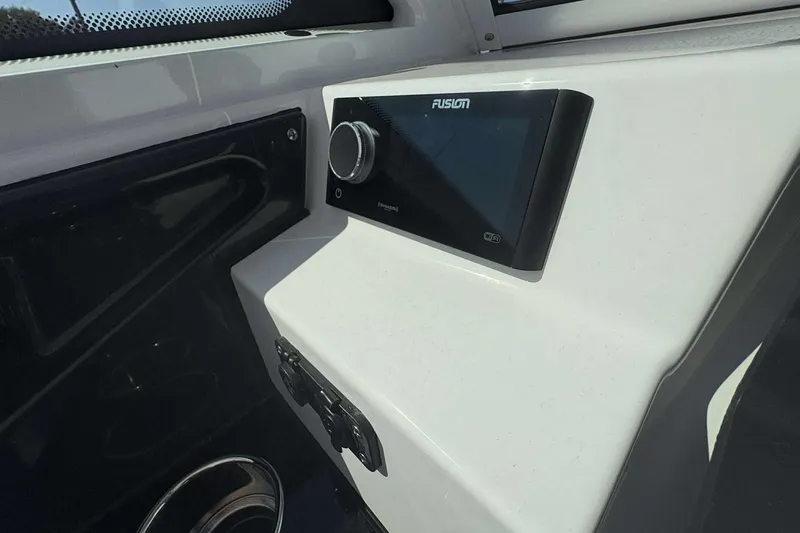 Slide: The Image of Fusion audio system on 2026 Blackfin 272 DC boat dashboard. - 23