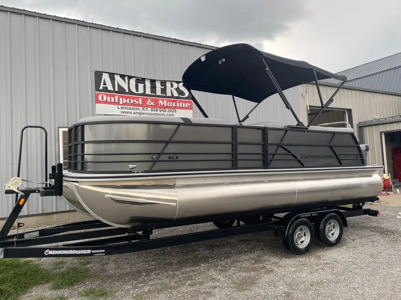 Slide: The Image of 2025 Berkshire 22 CL2 pontoon boat on trailer at Anglers Outpost & Marine. - 2