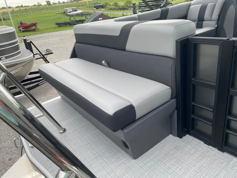 Slide: The Image of 2025 Berkshire 22 CL2 boat interior with gray seating and modern design. - 20