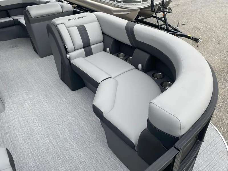 Slide: The Image of Luxurious seating on 2025 Berkshire 22 CL2 pontoon boat with cup holders. - 9