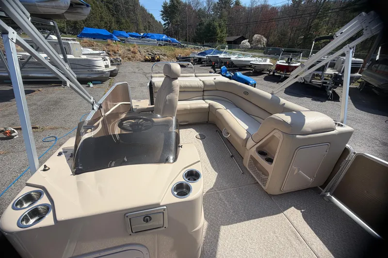 Slide: The Image of 2010 Harris FloteBote 240 Grand Mariner pontoon boat with spacious seating and helm. - 17