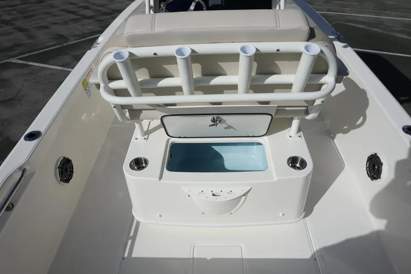 Slide: The Image of 2026 Boston Whaler 220 Dauntless boat interior with seating and storage compartments. - 15
