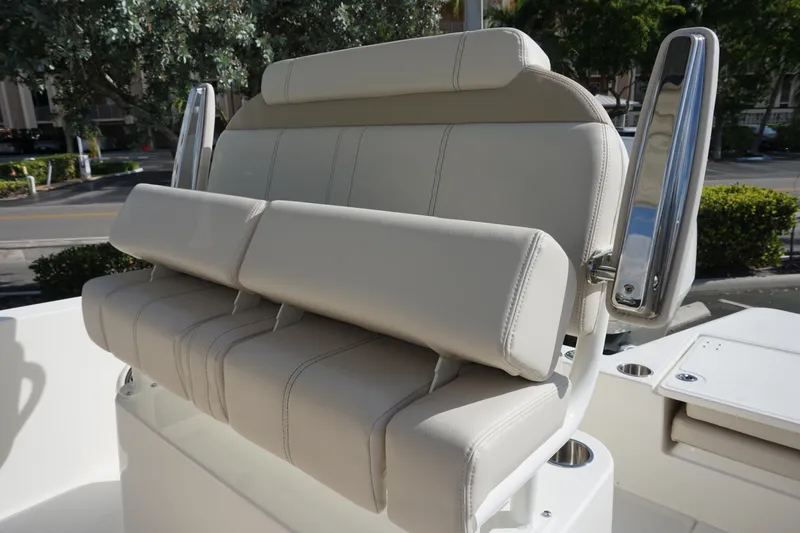 Slide: The Image of 2026 Boston Whaler 220 Dauntless boat seat with stainless steel handles. - 20