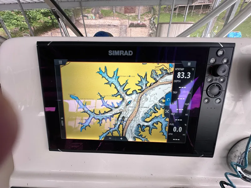 Slide: The Image of Simrad navigation display on 2013 World Cat 255 DC boat, showing detailed waterway map. - 2