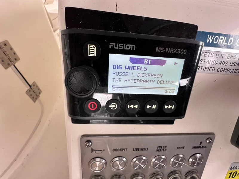 Slide: The Image of Fusion MS-NRX300 stereo on 2013 World Cat 255 DC, playing "Big Wheels" by Russell Dickerson. - 3