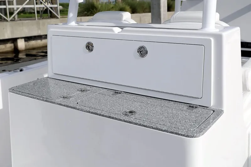 Slide: The Image of Manufacturer Provided Image: Rod holders on a 2021 Twin Vee 280 CC GF boat, docked near palm trees. - 12