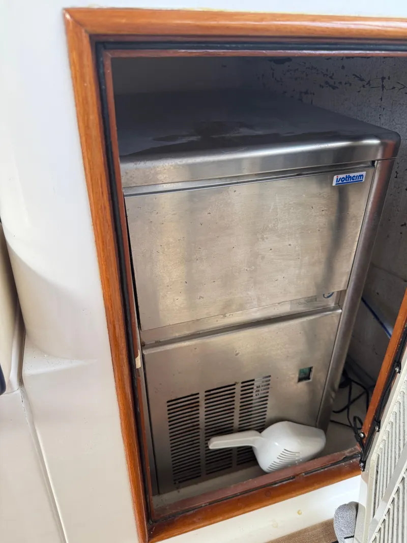 Slide: The Image of Built-in ice maker on 2002 Grand Banks 43 Eastbay HX yacht. - 25