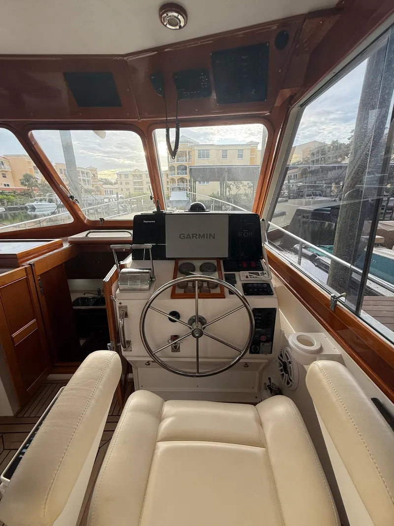 Slide: The Image of Helm of 2002 Grand Banks 43 Eastbay HX with Garmin navigation system. - 37