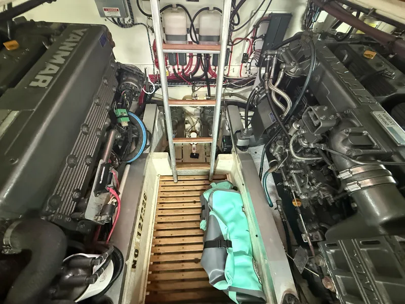 Slide: The Image of Engine room of 2002 Grand Banks 43 Eastbay HX with Yanmar engines and equipment. - 42