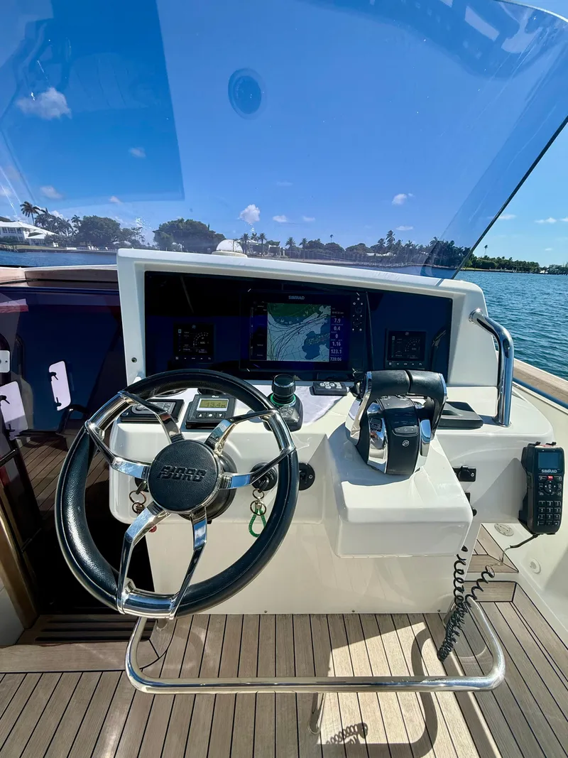 Slide: The Image of Helm of 2019 Fjord 36' Open boat with navigation equipment and steering wheel. - 9