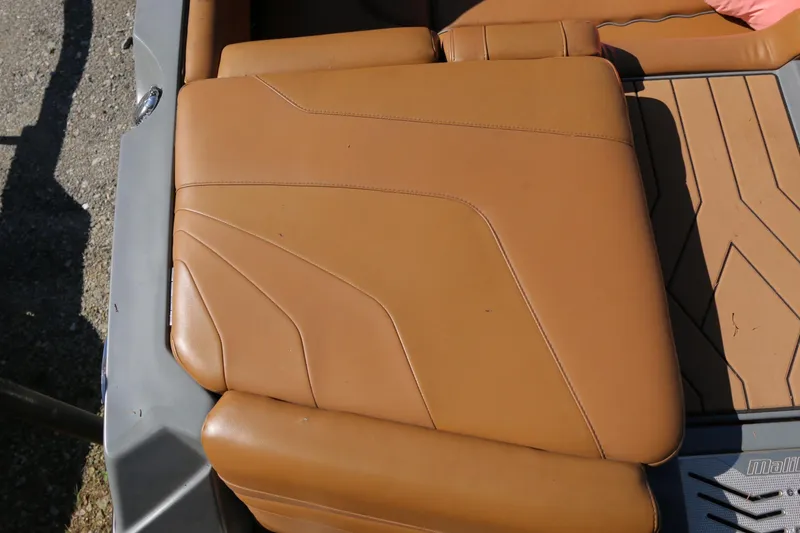 Slide: The Image of 2019 Malibu Wakesetter 22 MXZ tan leather seat detail. - 11