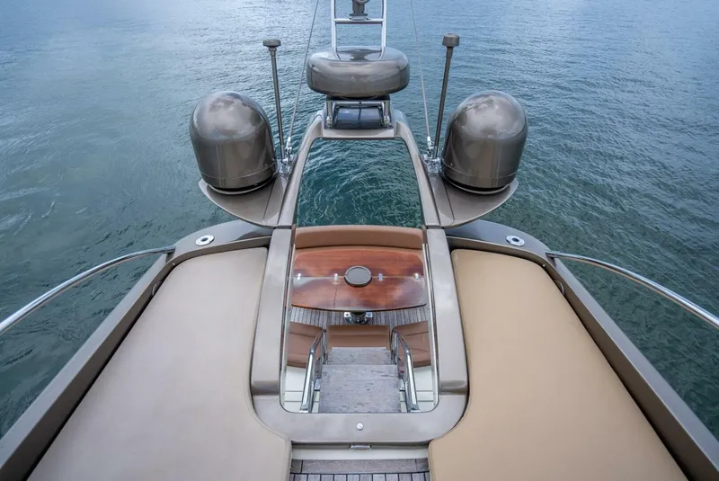 Slide: The Image of Luxury Riva Sport 56 yacht deck, 2012 model, overlooking calm blue waters. - 15