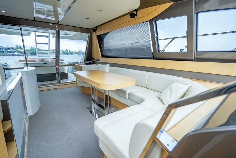 Slide: The Image of Luxurious interior of 2012 Riva Sport 56 yacht with elegant seating and panoramic windows. - 26