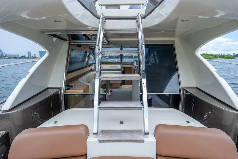 Slide: The Image of Luxurious 2012 Riva Sport 56 yacht interior with sleek design and modern amenities. - 7