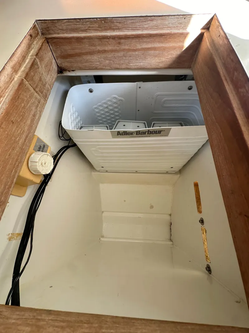 Slide: The Image of Built-in cooler compartment on 1987 Hunter Legend 45 sailboat. - 31