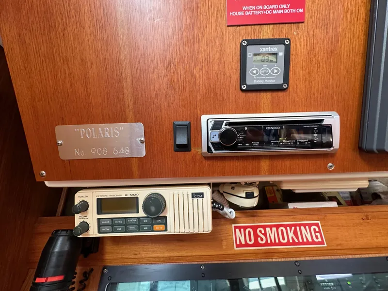 Slide: The Image of Control panel of 1987 Hunter Legend 45 yacht with radio and "No Smoking" sign. - 41