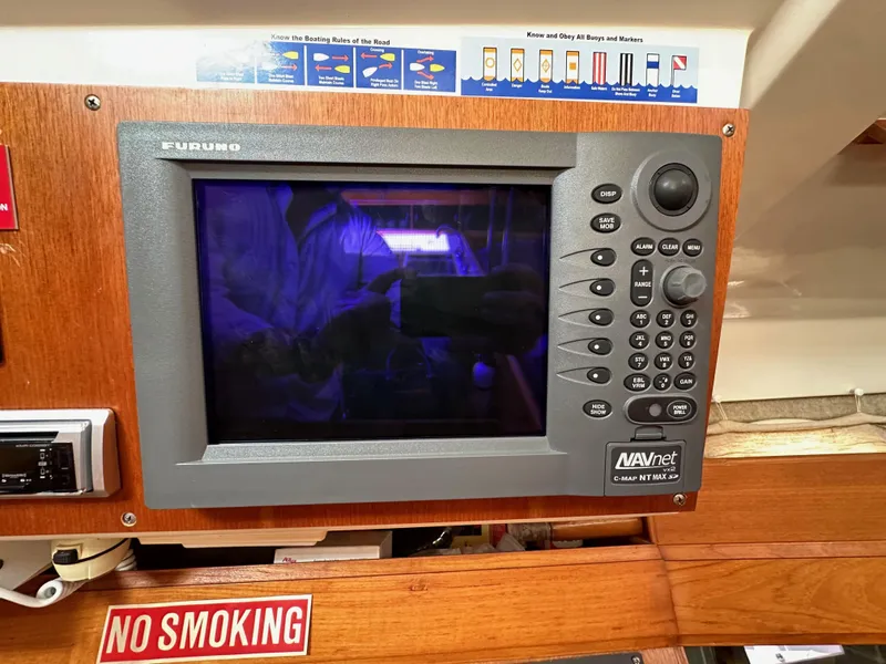 Slide: The Image of Furuno navigation system on 1987 Hunter Legend 45 sailboat, with "No Smoking" sign. - 42