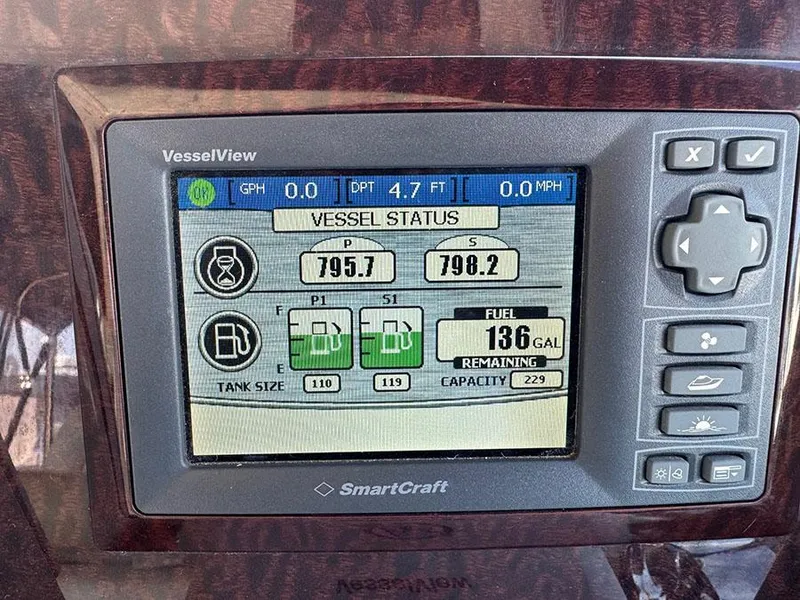 Slide: The Image of SmartCraft VesselView display on 2009 Sea Ray 330 Sundancer showing fuel and engine status. - 16