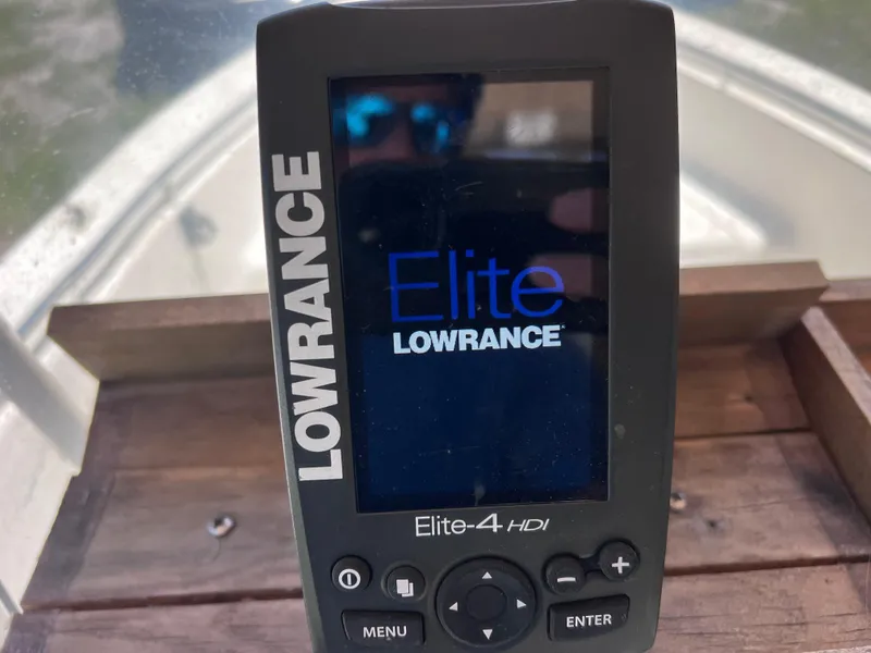 Slide: The Image of Lowrance Elite-4 HDI fishfinder on 2000 Scout 185 Sportfish boat dashboard. - 12