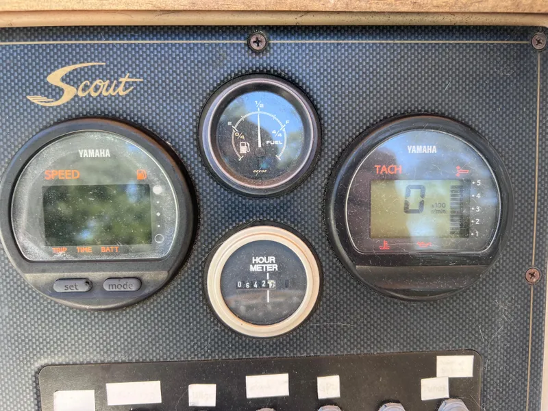Slide: The Image of Dashboard of a 2000 Scout 185 Sportfish boat with Yamaha gauges. - 13