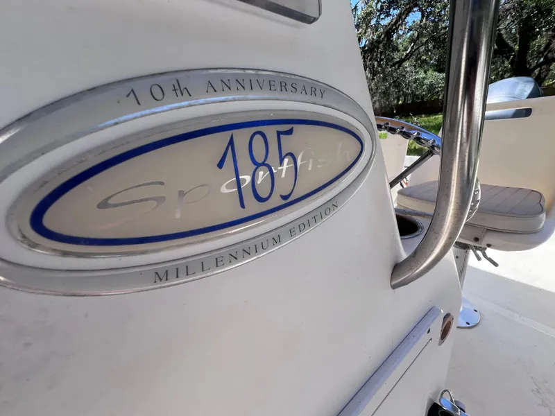 Slide: The Image of Scout 185 Sportfish 2000 Millennium Edition boat, 10th anniversary emblem detail. - 23