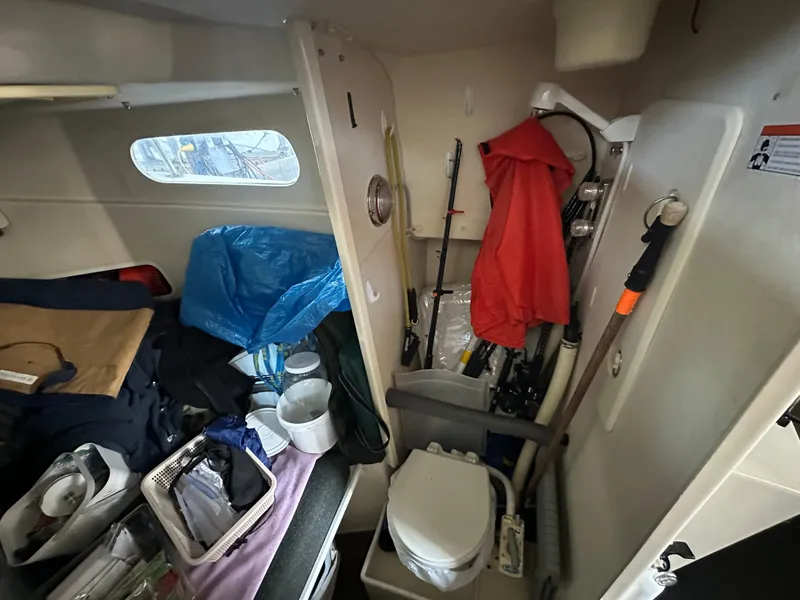 Slide: The Image of Interior of 2007 Rosborough R-246 boat with storage and equipment. - 15