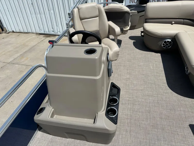 Slide: The Image of 2025 Sun Tracker Bass Buggy 18 DLX interior with steering console and seating. - 14