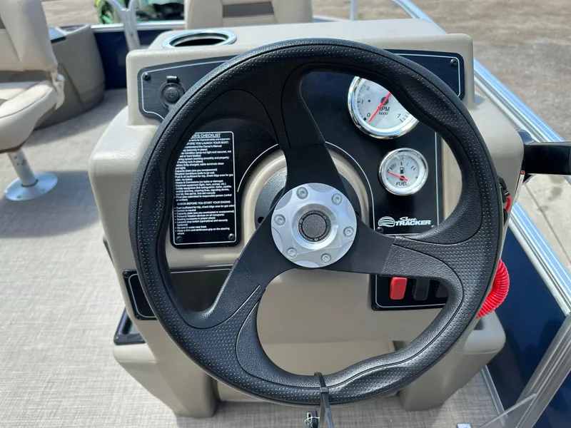 Slide: The Image of Steering wheel and dashboard of 2025 Sun Tracker Bass Buggy 18 DLX boat. - 20