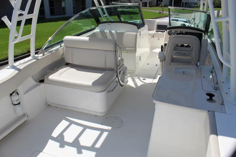 Slide: The Image of 2018 Boston Whaler 270 Vantage boat interior with seating and helm station. - 26
