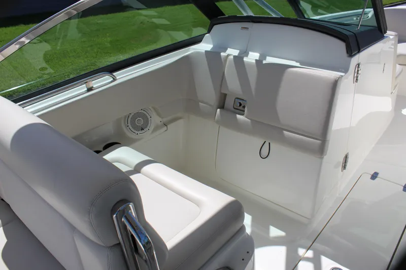 Slide: The Image of 2018 Boston Whaler 270 Vantage interior with white seating and sleek design. - 49