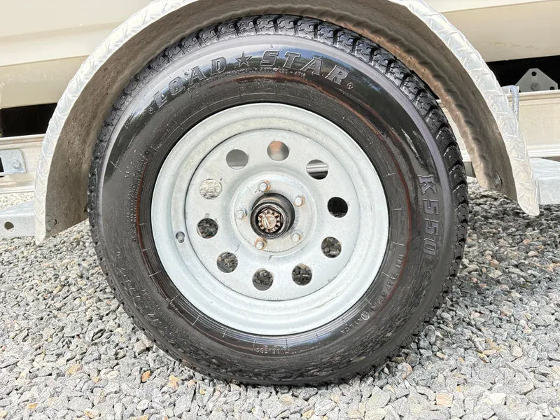 Slide: The Image of Trailer wheel with Loadstar K550 tire on gravel, Stingray 188 LX, 2016 model. - 5