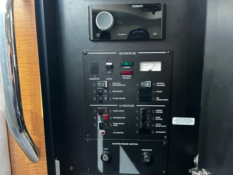 Slide: The Image of Electrical control panel on a 2006 Sea Ray 290 Sundancer boat. - 25