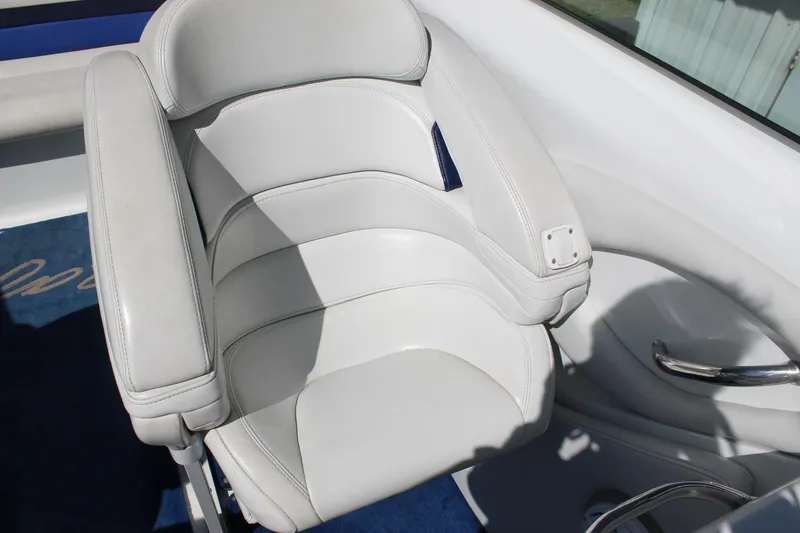Slide: The Image of White leather seat on a 2002 Baja 342 boat, featuring sleek design and comfort. - 20