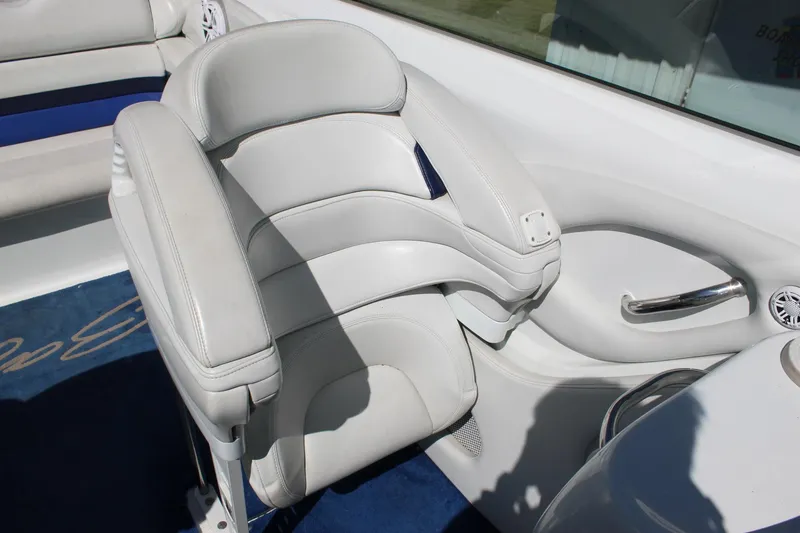 Slide: The Image of White leather seat on 2002 Baja 342 boat, featuring sleek design and comfortable padding. - 21