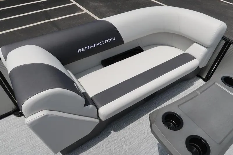 Slide: The Image of Bennington S Quad Bench 22 SSR, 2026 model, featuring sleek gray and white seating. - 11