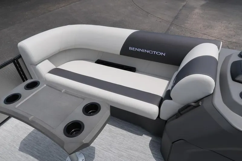 Slide: The Image of 2026 Bennington S Quad Bench 22 SSR with cup holders and sleek seating design. - 13