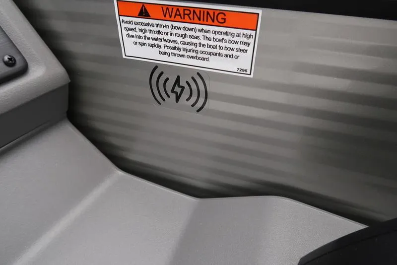 Slide: The Image of 2026 Bennington S Quad Bench 22 SSR warning label and wireless charging symbol. - 20