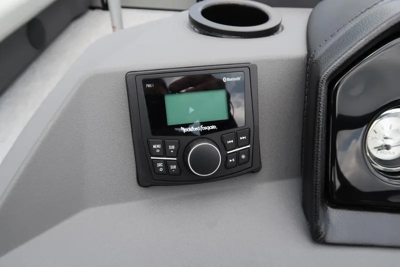 Slide: The Image of 2026 Bennington S Quad Bench 22 SSR dashboard with Rockford Fosgate audio system. - 22