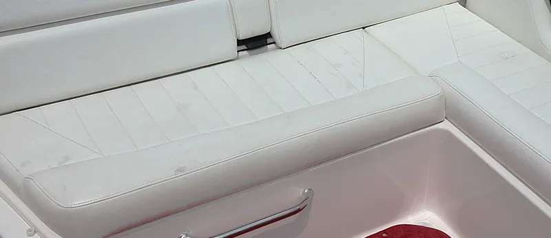 Slide: The Image of White seating area on a 2009 Regal 2200 Bowrider boat. - 19