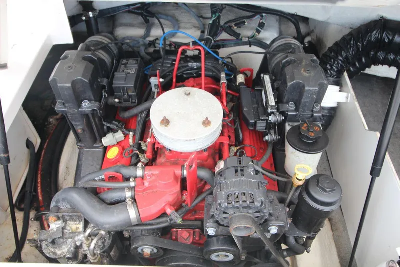 Slide: The Image of Engine of 2009 Regal 2200 Bowrider boat, showcasing mechanical components. - 23