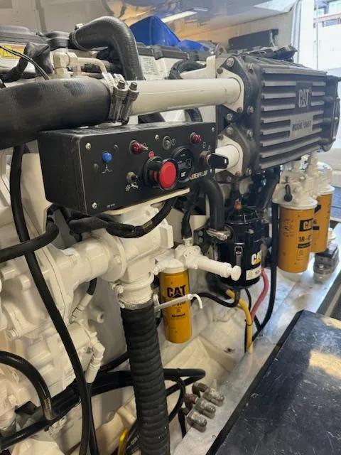 Slide: The Image of Engine room of a 1988 Bertram 54 Convertible with CAT marine power components. - 24